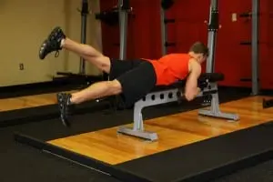 leg swings lying on the bench