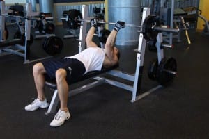 Reverse bench press on the bench