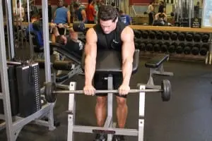 the Rise of EZ-bar biceps on the Scott bench reverse grip