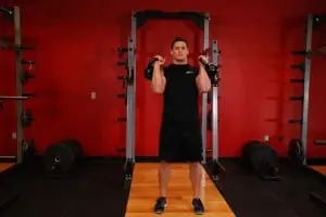 Alternating standing press weights