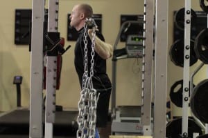 Squats, using a box and chain