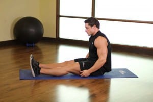 Stretching calf muscles in a sitting position