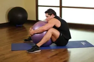 Stretching with a yoga ball