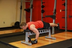 Dilution of dumbbells in hand while lying face down