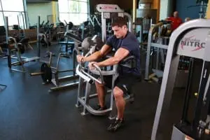 Flexion of hands on a biceps machine