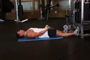 the Bending of the arms at the biceps on the block in the prone position