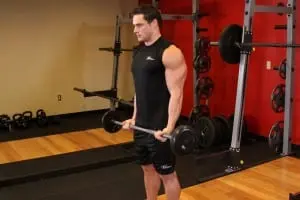 the Bending of the arms at the biceps with a barbell, diverting elbows back