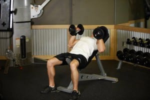 dumbbell Bench press lying on the bench with a positive grip incline hammer