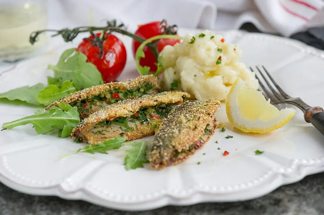 Baltic herring recipe in garlic sauce. Calorie, chemical composition and nutritional value.