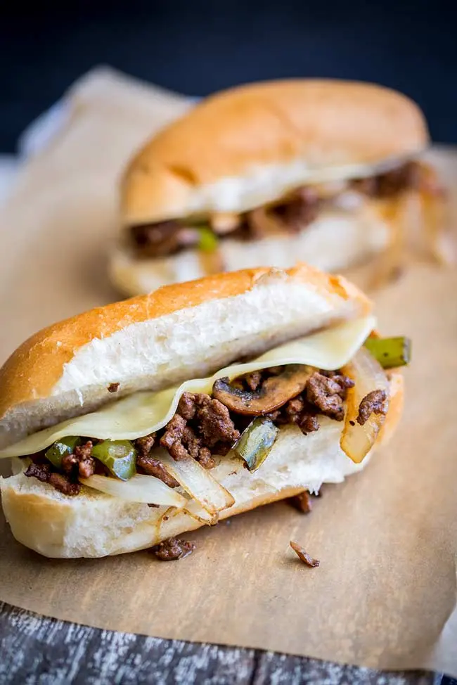 Beef, sandwich steaks, minced, shaped and thinly sliced, raw