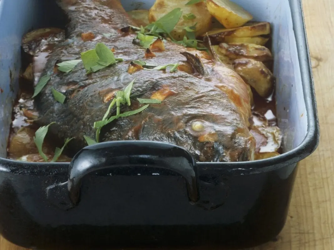 Calorie Carp in tomato sauce. Canned food. Chemical composition and nutritional value.