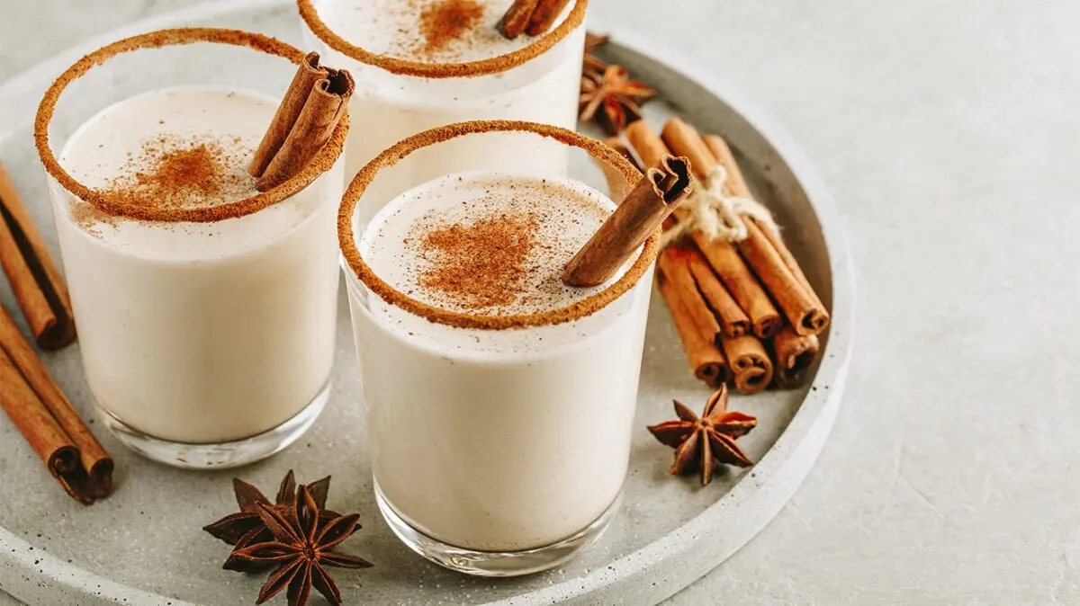 Calorie content Egnog (a drink made from beaten eggs with sugar, rum or wine). Chemical composition and nutritional value.