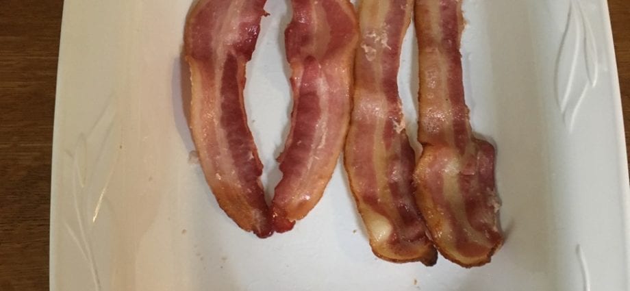 Calorie content Lightly salted bacon, cooked. Chemical composition and nutritional value.