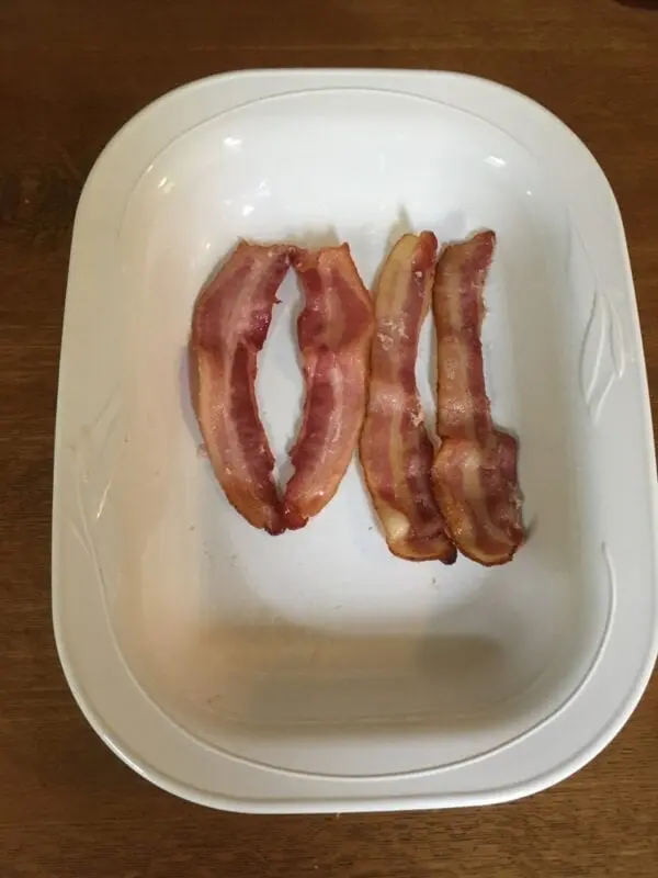 Calorie content Lightly salted bacon, cooked. Chemical composition and nutritional value.