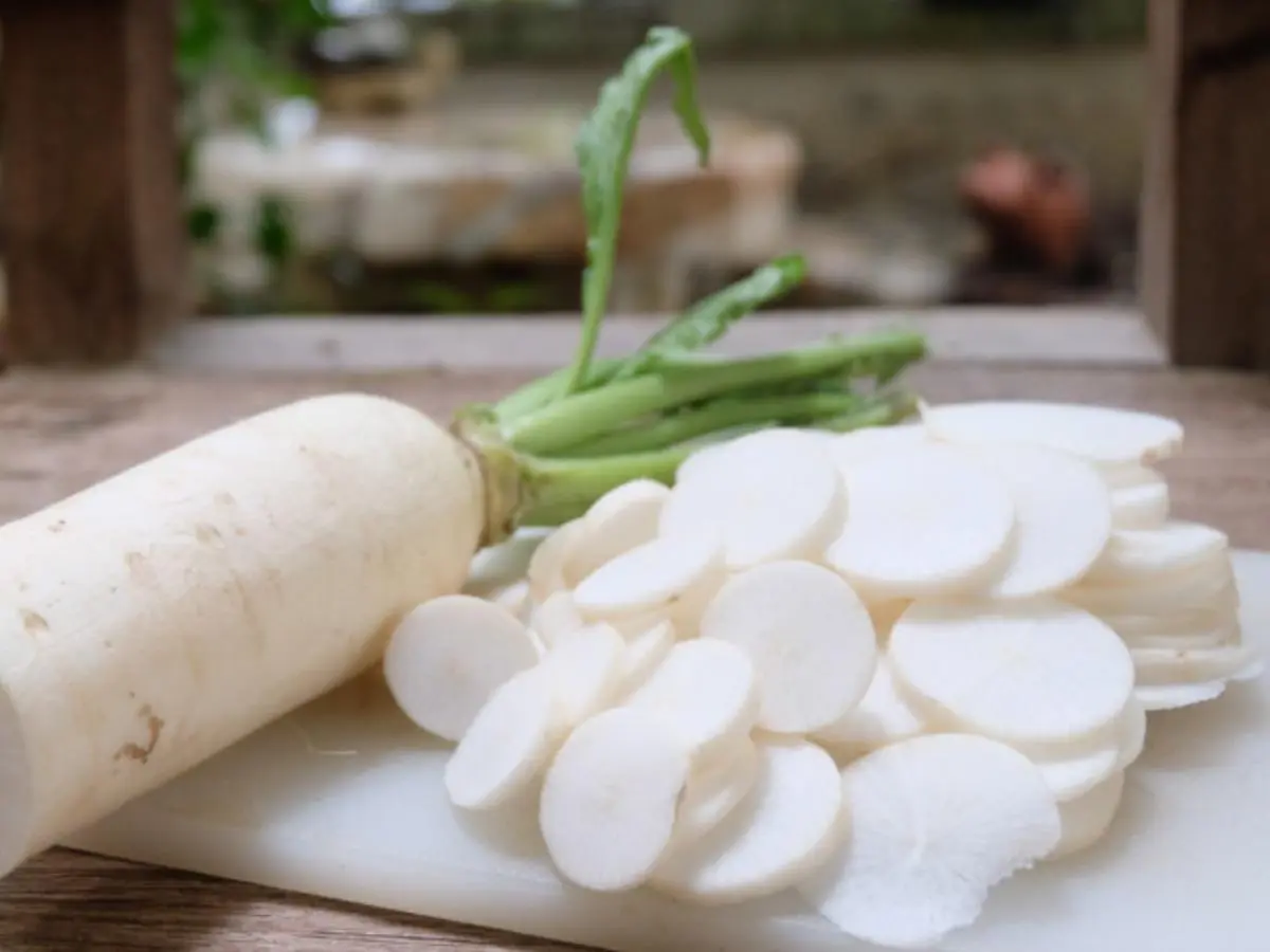 Calorie content White radish (daikon, oriental radish), boiled, with salt. Chemical composition and nutritional value.