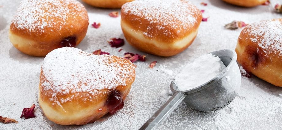 Calorie Donuts, yeast, with jelly filling. Chemical composition and nutritional value.