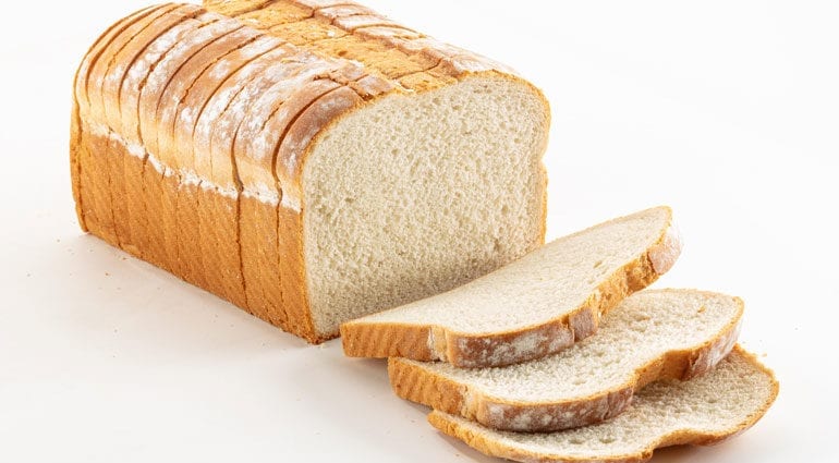 Kalori Loaf dihiris dari tepung premium (roti). Komposisi kimia dan nilai pemakanan.