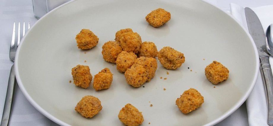 Calorie Salmon nuggets, breaded, frozen, reheated. Chemical composition and nutritional value.