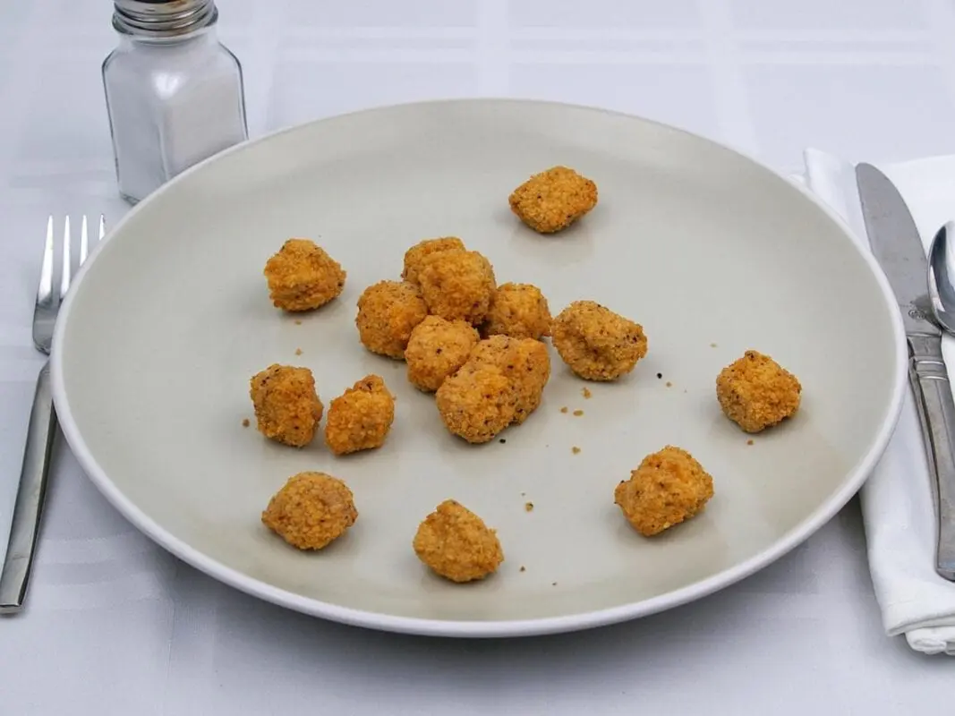 Calorie Salmon nuggets, breaded, frozen, reheated. Chemical composition and nutritional value.