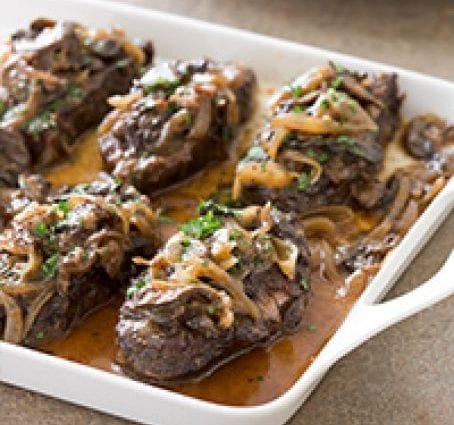 Recipe Baked beef in onion sauce. Calorie, chemical composition and nutritional value.