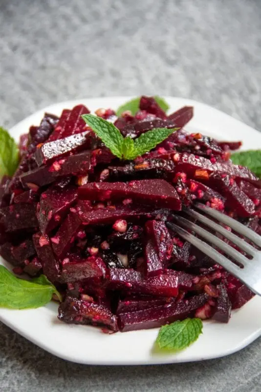 Recipe Beetroot Salad with Prunes, Nuts and Garlic. Calorie, chemical composition and nutritional value.