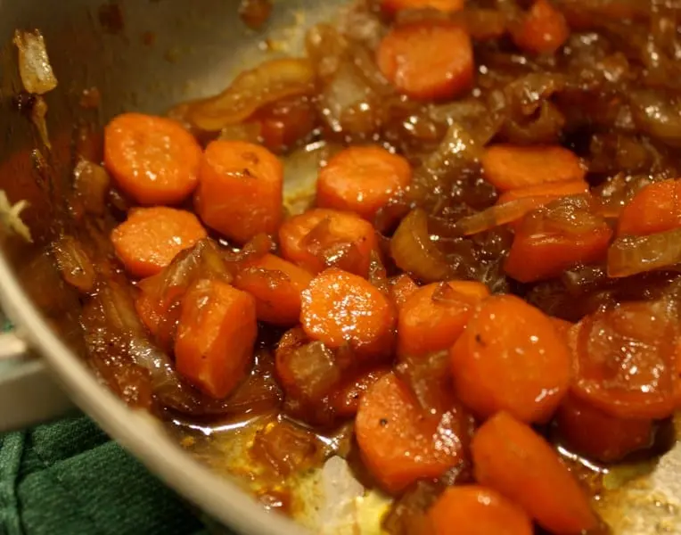 Recipe Carrots stewed with onions. Calorie, chemical composition and nutritional value.