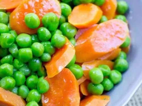 Recipe Carrots with green peas in milk sauce. Calorie, chemical composition and nutritional value.