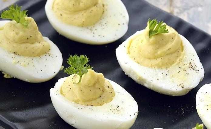 Recipe Eggs with mayonnaise with a side dish. Calorie, chemical composition and nutritional value.