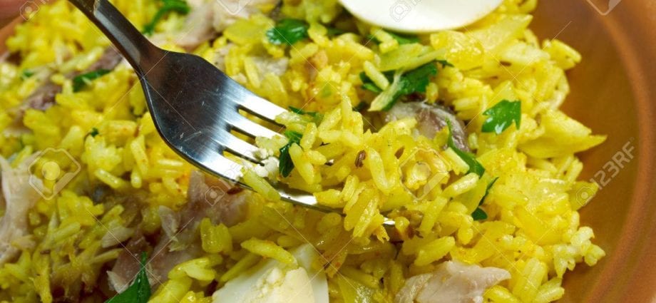 Recipe Herring baked with rice and cabbage. Calorie, chemical composition and nutritional value.