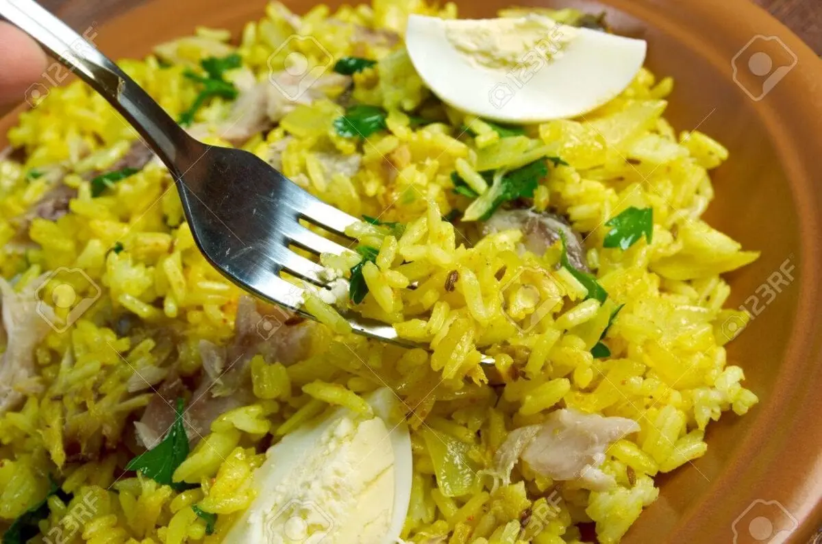 Recipe Herring baked with rice and cabbage. Calorie, chemical composition and nutritional value.