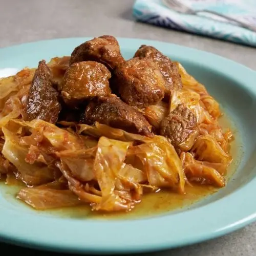 Recipe Pork stewed with cabbage. Calorie, chemical composition and nutritional value.