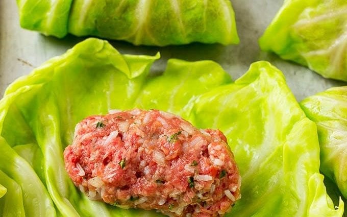 Recipe Rice in cabbage leaves with minced meat. Calorie, chemical composition and nutritional value.