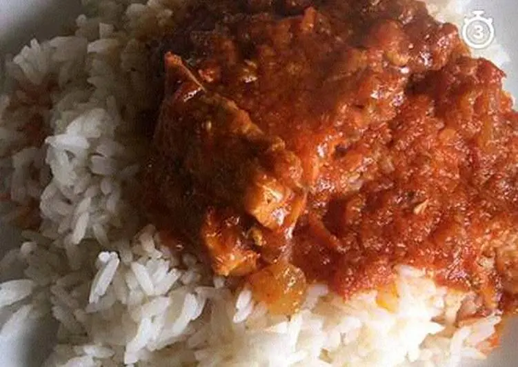 Recipe Stewed rice with tomato. Calorie, chemical composition and nutritional value.