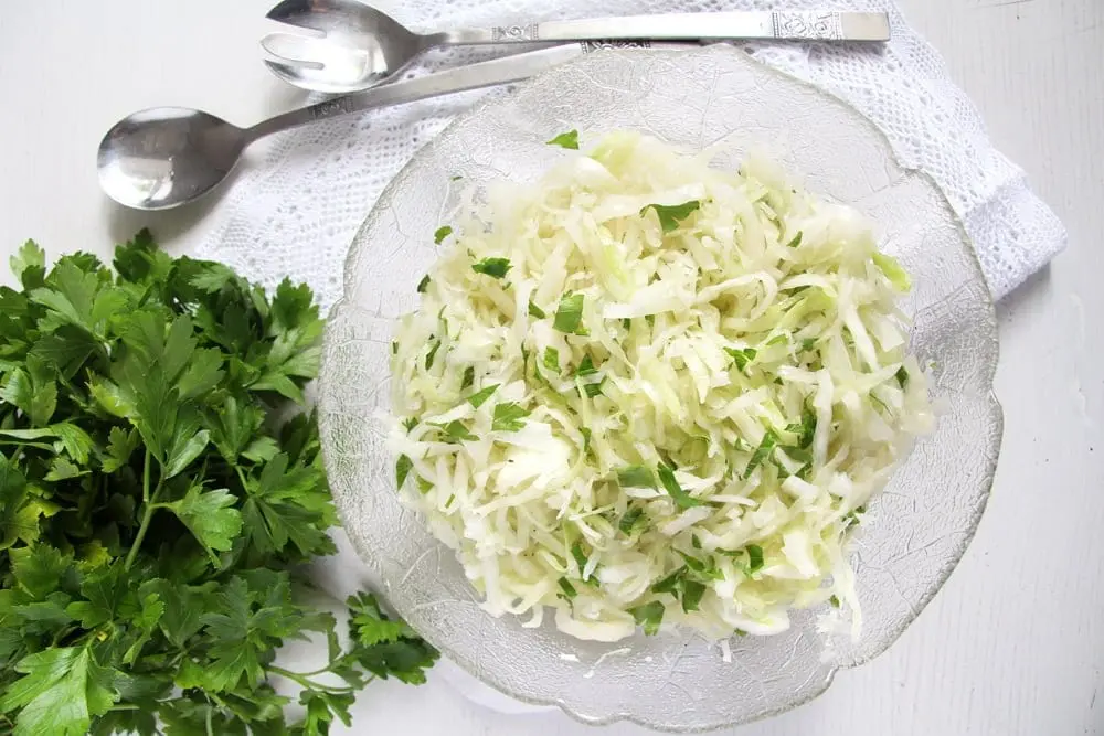 Recipe White cabbage salad with herring and bacon. Calorie, chemical composition and nutritional value.