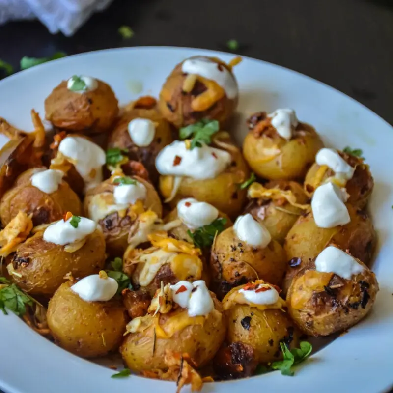 Recipe Young potatoes in sour cream. Calorie, chemical composition and nutritional value.