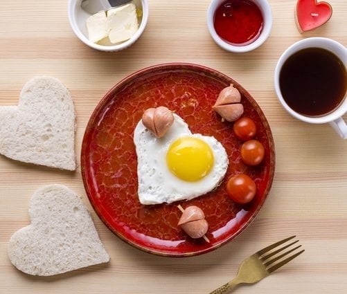 Romantic breakfast: heart-shaped egg