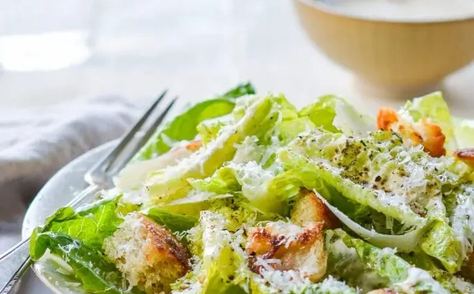 The recipe for Caesar salad is classic. Calorie, chemical composition and nutritional value.