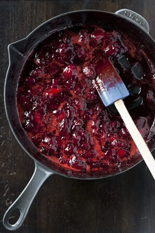 Can you cook jam in a cast iron pot?