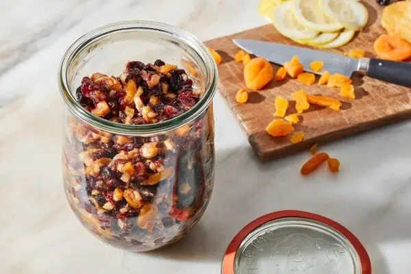 Why is there a bloom on the dried fruit compote?