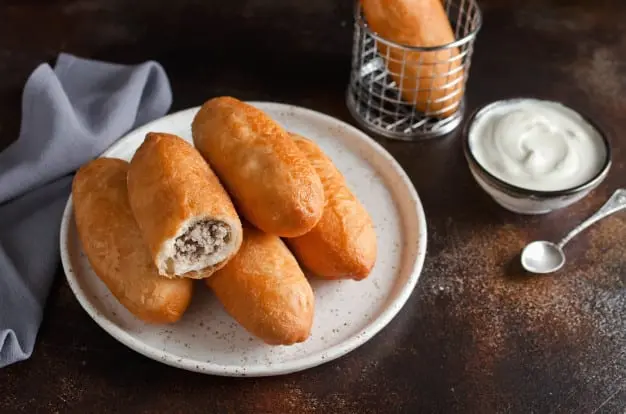 Pies with liver and potatoes