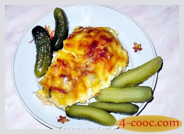 Pink salmon under a fur coat in the oven