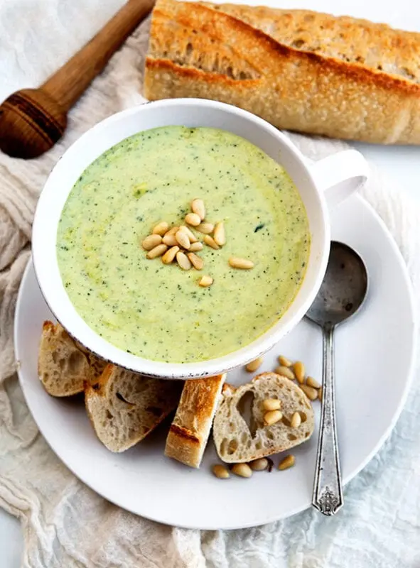 Zucchini puree soup with melted cheese