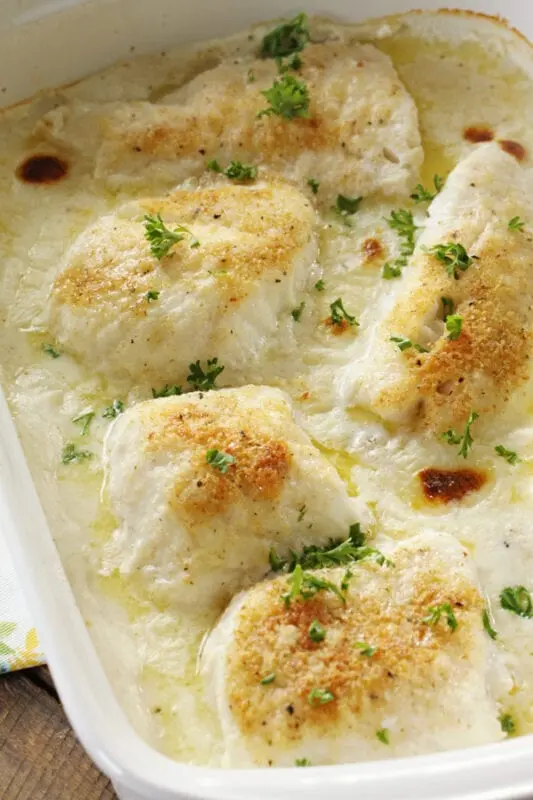 Cod baked in cream cheese sauce