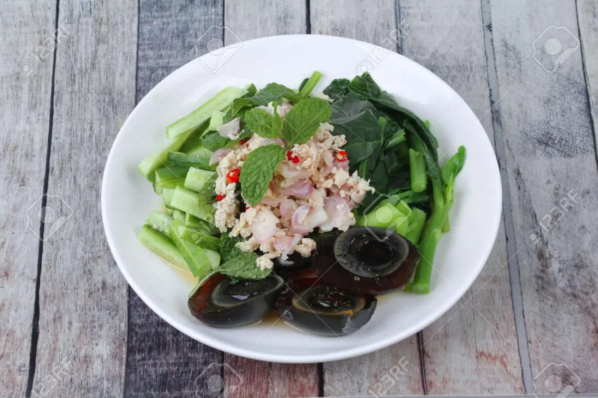 Pork salad with cucumber and egg