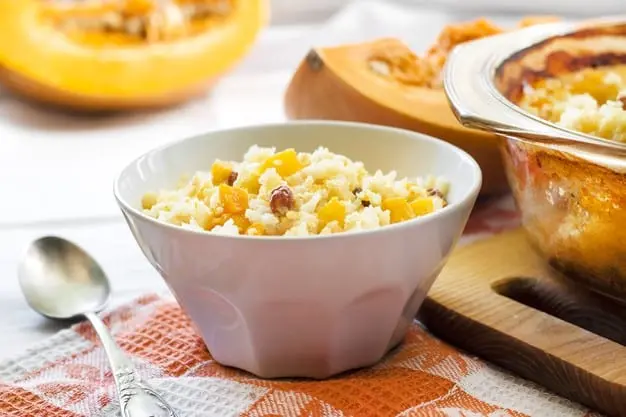 Pumpkin porridge with millet, dried apricots, raisins