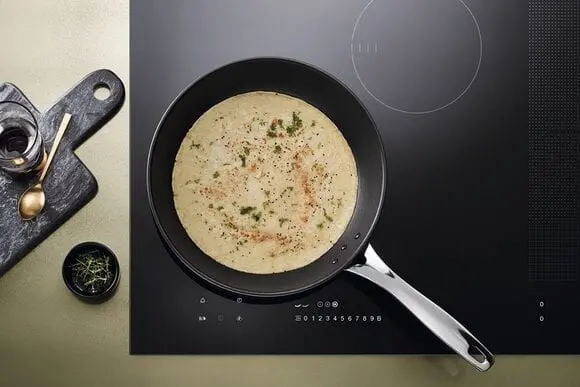 Without fuss: preparing a New Year’s dinner with the Miele induction panel