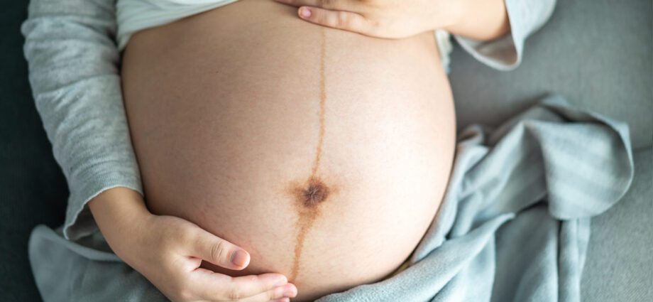 Kõhuvalu raseduse ajal teisel trimestril: miks tõmmata, allpool