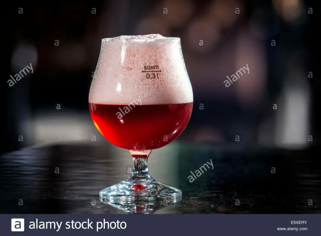 Cherry beer is a frothy drink. Video