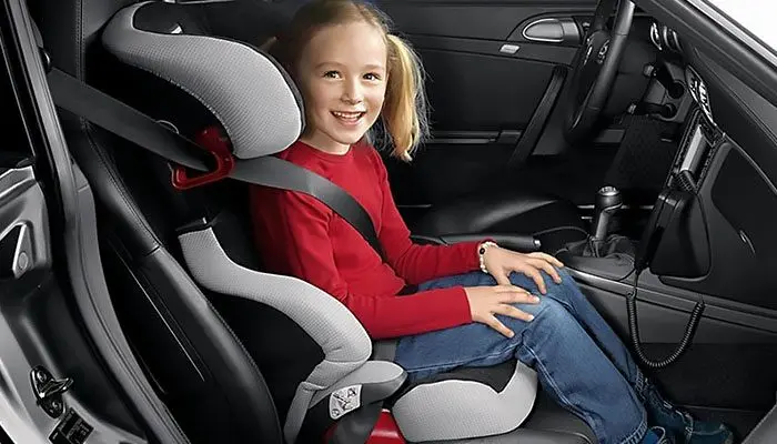 Is it possible to carry a child in the front seat and how old is it?