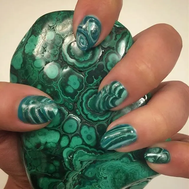 Manicure with stones: malachite, granite and crystals